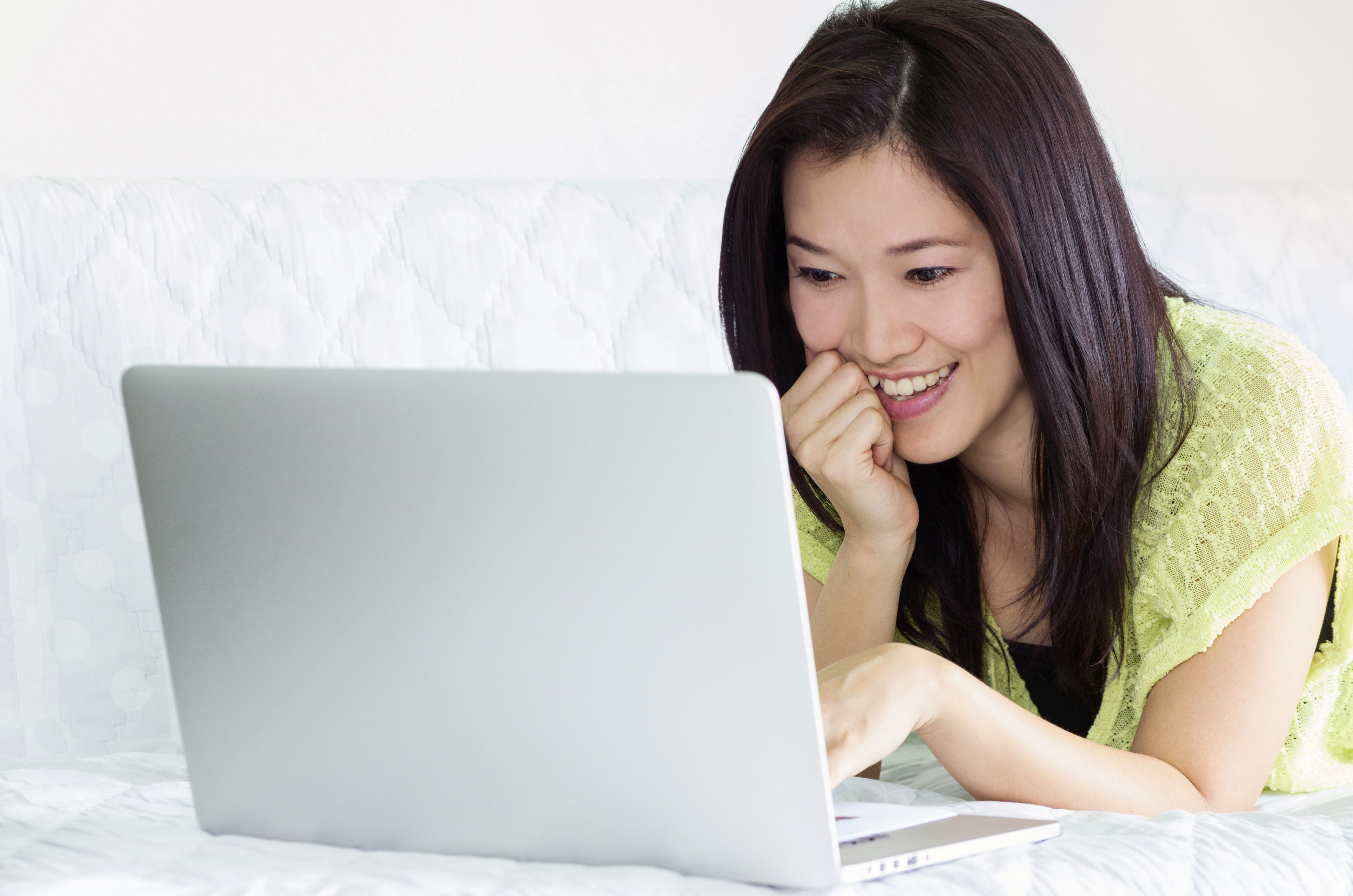 Happy young Women using laptop