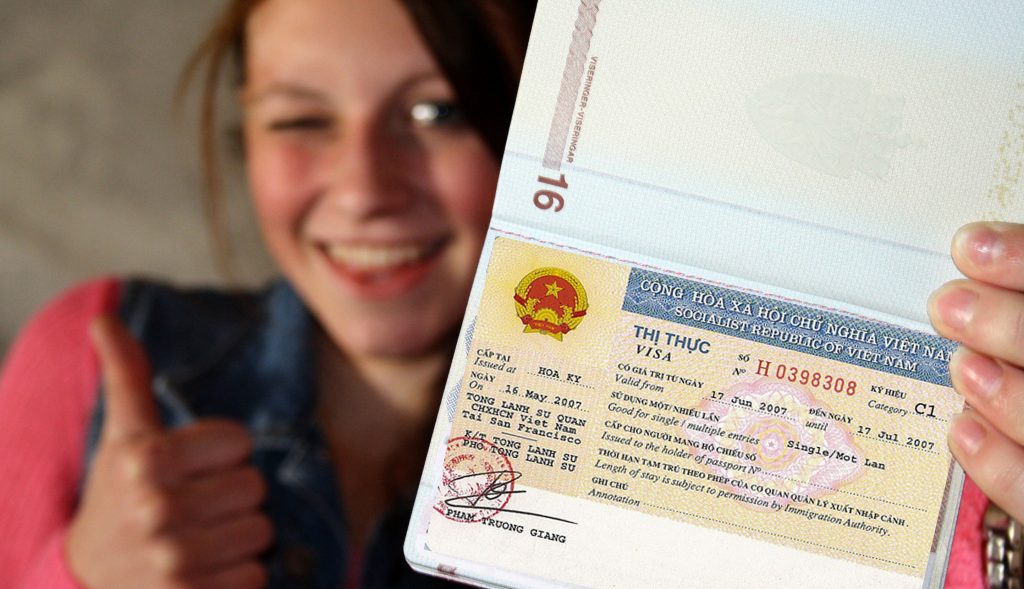 Woman holding the Vietnam Visa