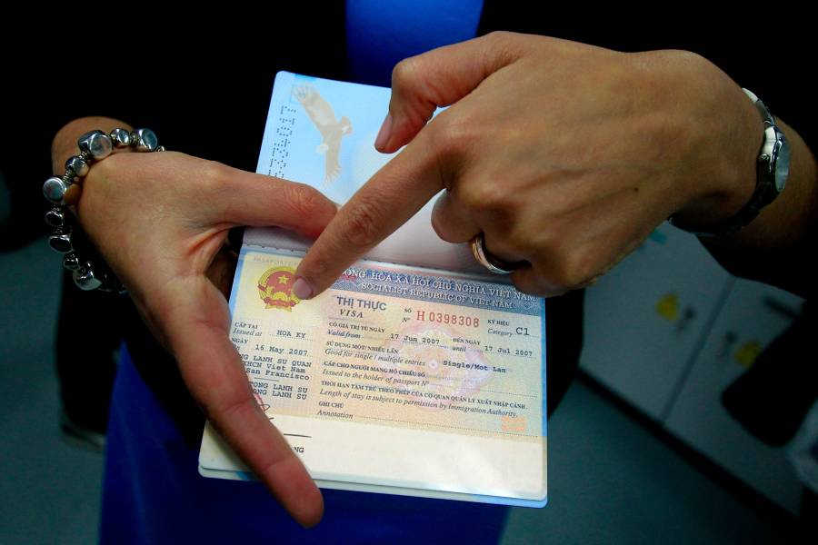 Women having the Vietnam Visa in hand