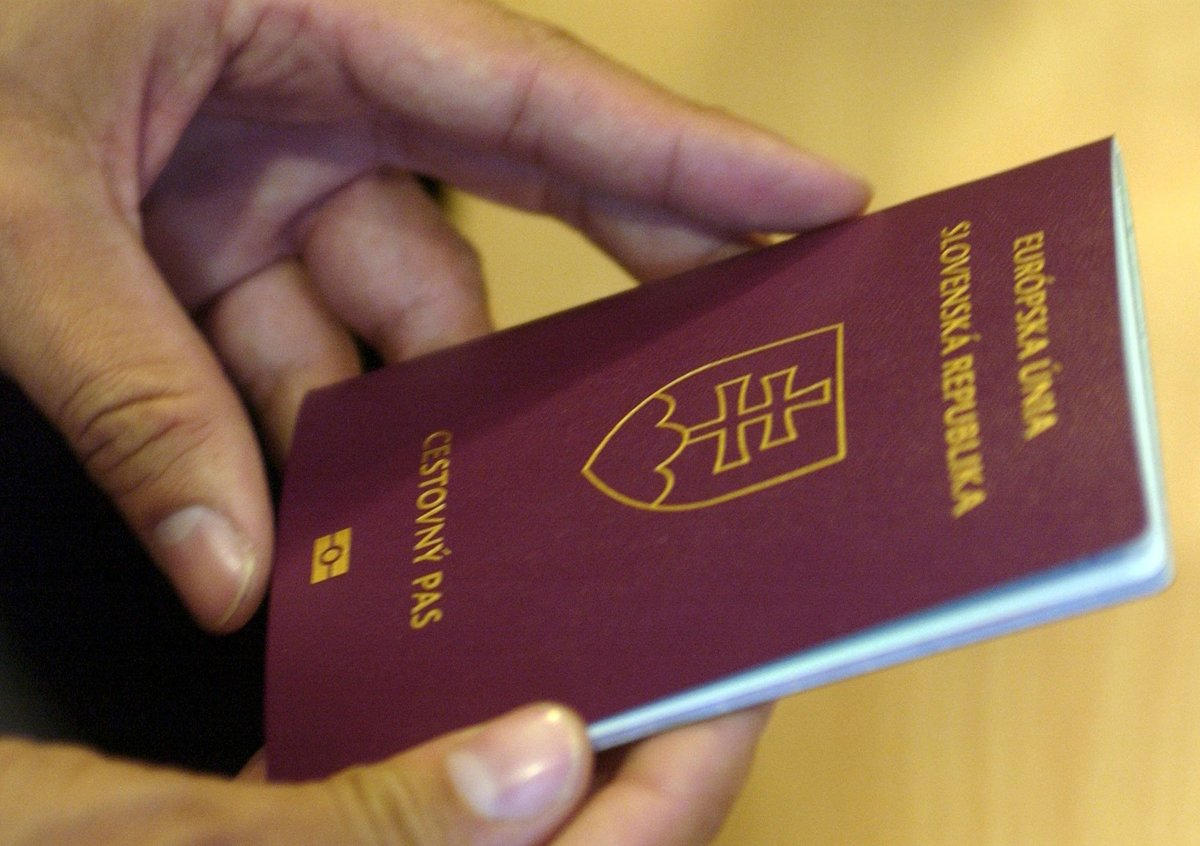 Slovakia passport holding in hand